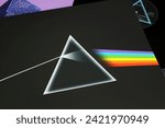 Small photo of Viersen, Germany - January 9. 2024: Closeup of Pink Floyd best selling album vinyl record cover the dark side of the moon from 1973 (focus on center)
