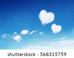 It Is Two Heart Clouds On Blue...