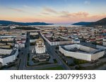 Small photo of Aerial view of the city of Magadan. Beautiful morning cityscape. Top view of the Cathedral, streets and buildings. In the distance, mountains and a sea Bay. Magadan, Magadan Region, Russian Far East.