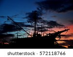 Silhouette Of Ship With Sunset