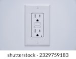 Small photo of Tamper resistant GFCI Ground Fault Circuit Interrupter power outlet