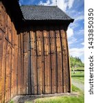 Small photo of Detail of the Kvikne Stave Church, a cruciform church dating from 1764 in the municipality of Nord-Fron in Oppland county, Norway. Wooden tarry wall.
