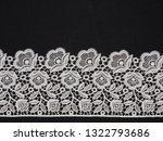 white lace on black background | Shutterstock . vector #1322793686