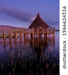 Small photo of Brecon, UK - April 21 2021: View at blue hour on the Cranog at Llangors Lake near Brecon in the Brecon Beacons, Wales, UK