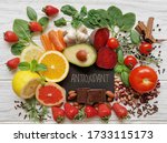 Healthy foods rich in antioxidants. Fresh fruit and vegetable, set of various spices and herbs high in antioxidants. Natural sources of antioxidants. Concept of diet and healthy eating.