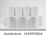 Small photo of Blank coffee cup in white background on muck up