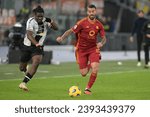 Small photo of 26th Nov 2023; Stadio Olimpico, Rome, Italy; Serie A football match 2023-2024 , AS Roma versus Udinese; Festy Ebosele of Udinese and Leonardo Spinazzola of AS Roma