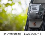 Small photo of Electricity meter Cobb energy pouring maintains topology background blur.
