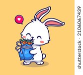 Cute Rabbit Holding Carrot...