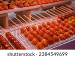 Small photo of A new style "Sugar-coated haws", which using strawberry instead of haws