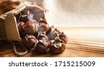 Chestnuts on a wooden...