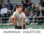 Small photo of Paris, France - 27 May 2022: Carlos Alcaraz (ESP) playing Sebastian Korda (USA) in the 3rd round night session on day 6 of the Roland Garros tennis tournament