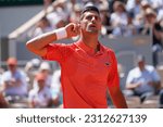 Small photo of Paris, France, 4 June 2023, Roland Garros tennis tournament: 3rd seed Serbian Novak Djokovic playing Peruvian Juan Pablo Varillas in the 4th round on Court Philippe Chatrier