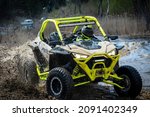 Small photo of ATV and UTV offroad vehicle racing in hard track with mud splash. Extreme, adrenalin. 4x4.