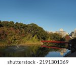Small photo of Osaka, Osaka Japan - December 6th 2020: A bridge and lake at Tennoji park in Osaka.