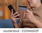 close up hand use credit card... | Shutterstock . vector #2153462029