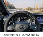 Small photo of Seoul, Korea - Nov 10 2021: Interior of Japanese car Infiniti Q30 stearing wheel and baseboard. A sporty vehicle CUV.