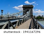 View of old historical Széchenyi Chain Bridge over Danube with clear blue sky in Budapest, Hungary