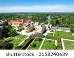 Lednice Chateau extra wide panorama aerial photography with garden and park on summer day. Lednice - Valtice landscape, Czech South Moravia region. World Heritage Site.