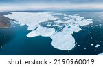 Small photo of Glaciers drone aerial image from above - climate change and global warming. Glaciers from a melting iceberg in Ilulissat, Greenland. The icy landscape of the Arctic nature in the UNESCO world