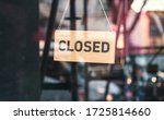 Small photo of A sign that says "Sorry, we're closed". Shops in Munich and throughout Germany and Europe close due to financial difficulties and economic crisis.