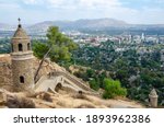 A beautiful shot of the stone cross tower in the Mount Rubidoux trail in California