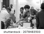 Small photo of JOHANNESBURG, SOUTH AFRICA - Oct 22, 2021: A grayscale of Delegates at healthcare workers conference on HIV in Johannesburg, South Africa