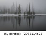 A grayscale landscape in Wyoming, Yellowstone national park in winter