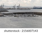 Small photo of SINES, PORTUGAL - May 04, 2022: An aerial shot of fishing boats moored in a harbor in Sines, Portugal