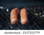 Small photo of Fast food prepared on the street in Guatemala, Central America, bread with sausages, cabbage, avocado and sauces, called Shuco Chapin