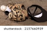 Small photo of BAKERSFIELD, UNITED STATES - Mar 02, 2022: The Baseball gear on the ground in California State University Bakersfield