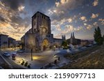 Small photo of BURGOS, SPAIN - Oct 13, 2021: A scenic view of the Church of San Esteban on a background of blue cloudy sky in twilight in Spain