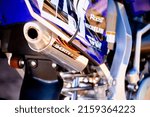 Small photo of CHARLOTTE, UNITED STATES - Dec 28, 2021: A closeup of a Yamaha YZ125 with FMF shorty silencer