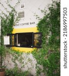 Small photo of SINGAPORE, SINGAPORE - May 01, 2022: A vertical shot of the hidden Kohi Coffee Bar on the corner of the street of Joo Chiat, Singapore