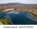 An aerial view of North Lake and Goodyear, Arizona cityscape with mountains in the background