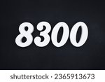 Small photo of Black for the background. The number 8300 is made of white painted wood.