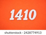 Orange felt is the background. The numbers 1410 are made from white painted wood.