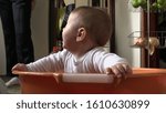 Baby in a laundry bucket image - Free stock photo - Public Domain