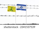 Small photo of Flag of Hezbollah and israel translate "Then surely the party of God are they that shall be triumphant" (Quran 5:56) Tensions escalate between Israel and Hezbollah in border region