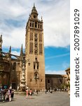 Small photo of Sevilla, Andalusia - Spain. 23 February 2013. .Giralda the tower of the Cathedral of Santa Maria de la Sede. In its upper part there is a ball called a jar on which the Giraldillo is located.