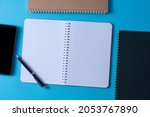top view of blank open notebook ... | Shutterstock . vector #2053767890