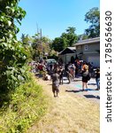 Small photo of Seattle, Victory Heights, WA / USA July 28, 2020: Black Lives Matter protesters gather in front of council person Debora Juarez' house to tell her to defund Seattle Police by 50%