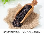 Small photo of black rice made in Japan (other name: forbidden rice, purple black rice, purple rice), healthy and rich in polyphenol