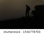 black climber in the mountains... | Shutterstock . vector #1536778703
