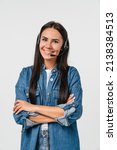 Small photo of Vertical portrait of young friendly caucasian woman IT support customer support agent hotline helpline worker in headset looking at camera while assisting customer client isolated in white background