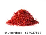 Small photo of Heap of saffron threads, autumn crocus, isolated on white background