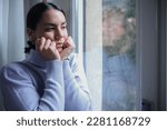 Small photo of Woman's emotional vulnerability and struggle with mental health challenges.