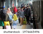 Small photo of JAKARTA, INDONESIA-MEI 2021-A number of travelers or Mudik are crammed into the train at Pasar Senen Station on May 17, 2021 in Jakarta.