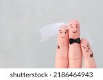 Small photo of Fingers art of Happy couple to get married. Concept of stepson vs wedding.
