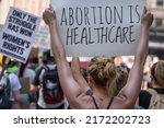 Small photo of Boston, MA, US-June 25, 2022: Protests holding pro-abortion signs at demonstration in response to the Supreme Court ruling overturning Roe v. Wade.